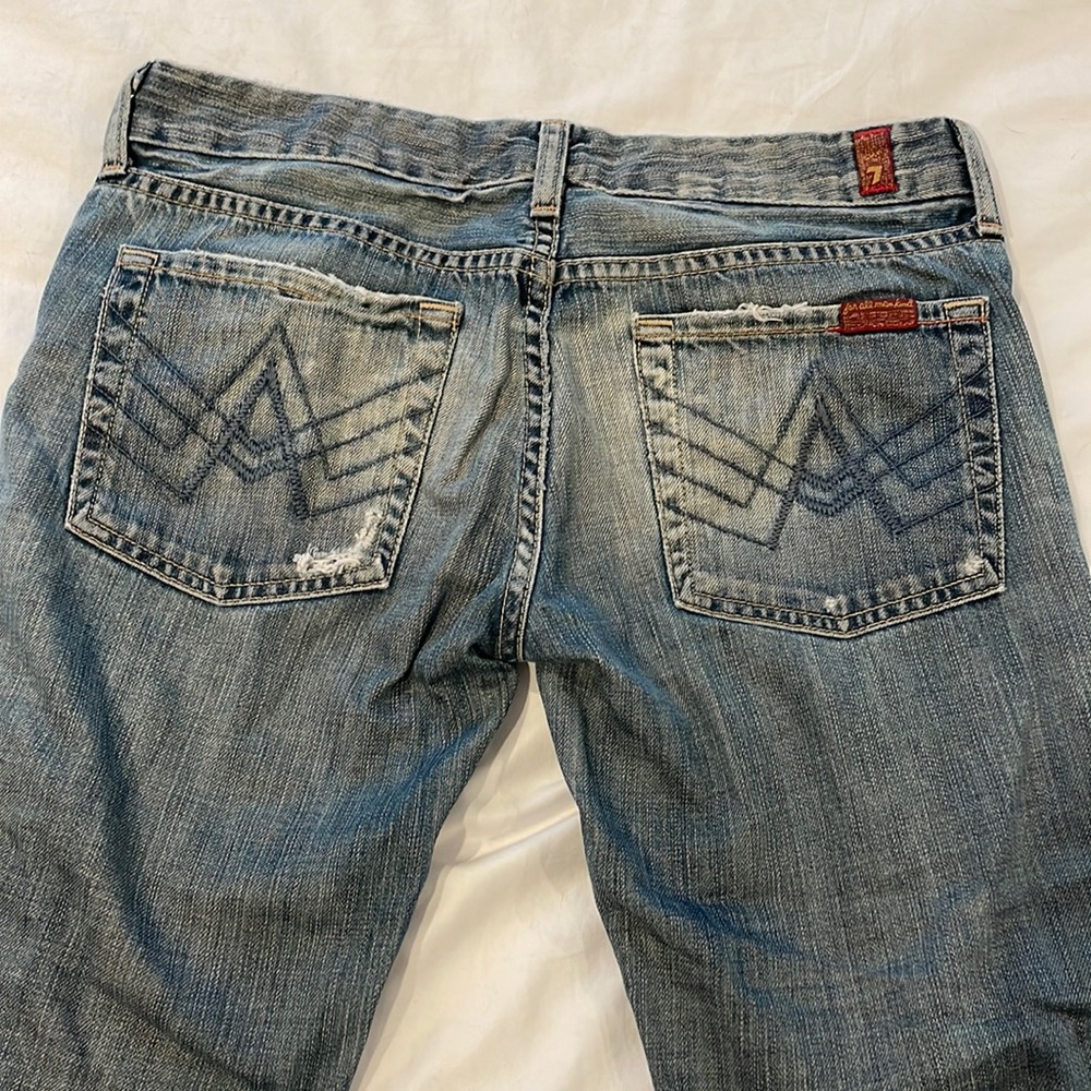 Distressed A pocket jean